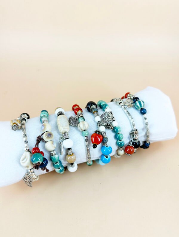 Lot de 12 Bracelets céramique avec charms