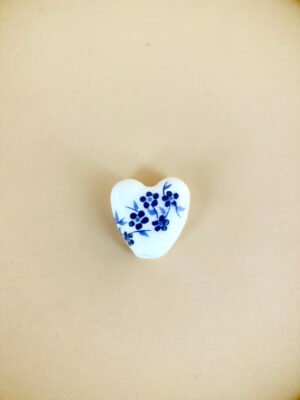 2 perles céramique coeur motif fleur