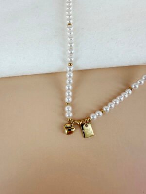 Collier perles avec médaillon « Good Luck » en acier inoxydable