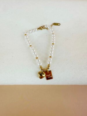 Bracelet perles et médaillon Good Luck