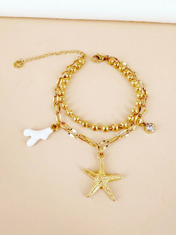 Bracelet breloque étoile de mer et corail blanc en acier inoxydable