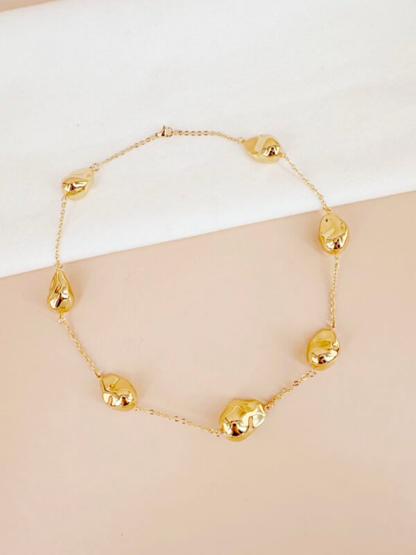 Collier perles dorées