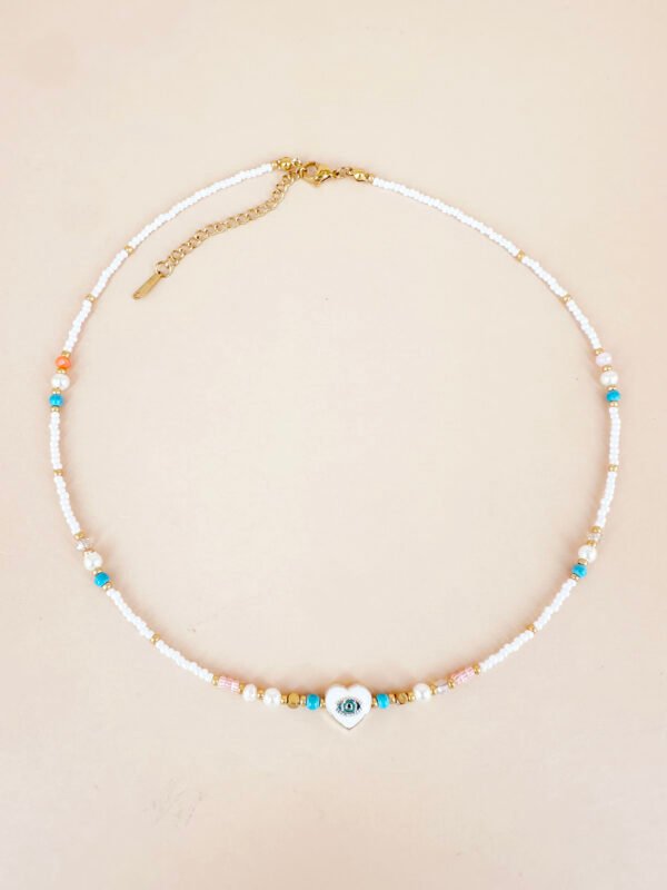 Collier  coeur oeil bleu et perles fait main en acier inoxydable
