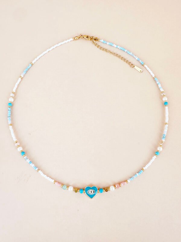 Collier  coeur oeil bleu et perles fait main en acier inoxydable
