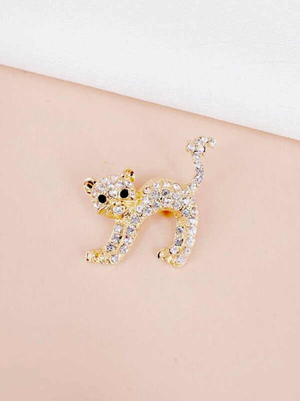 Broche chat doré
