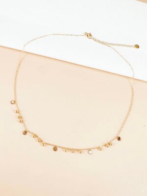 Collier chaîne fine perles et soleil en acier inoxydable