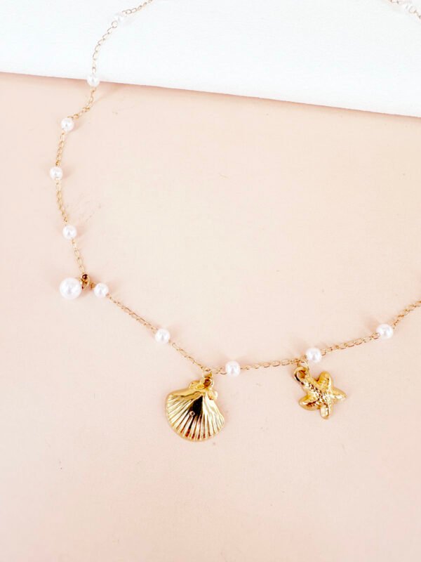 Collier perles avec coquillage et étoile en acier inoxydable