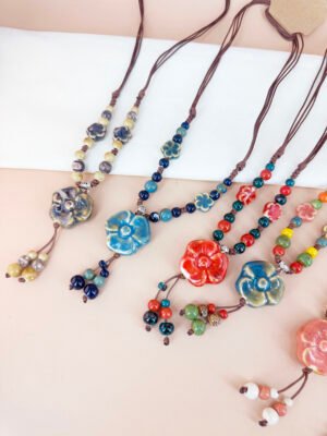 Collier perles céramique motif fleur