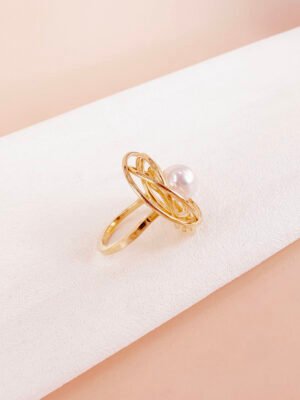 Bague torsade ovale avec perle