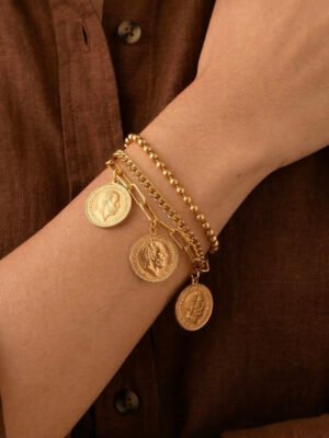 Bracelet breloques pièce dorée