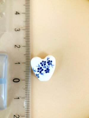 2 perles céramique coeur motif fleur