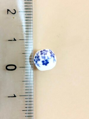 2 perles céramique motif fleur