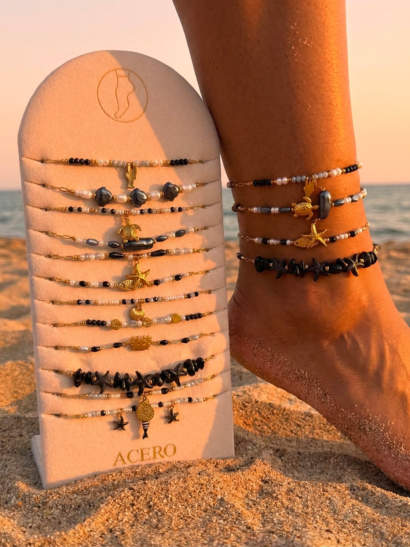 Lot de 12 bracelets cheville "océan" en acier Inoxydable - Noir