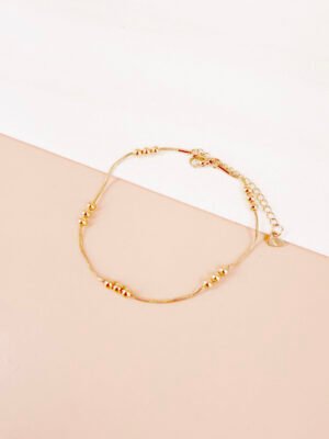 Chaine cheville Isora – Perles dorées