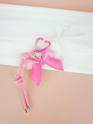 Porte clé sac grigri Mya – Noeud rose