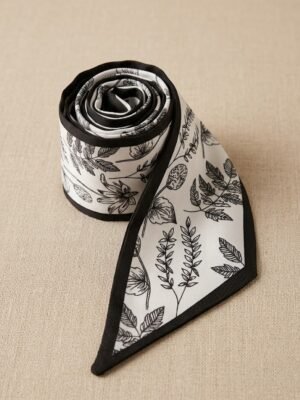 Foulard bandeau satiné noir motif feuillage