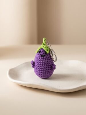 Porte-clés Celeste – Motif aubergine violette tricotée
